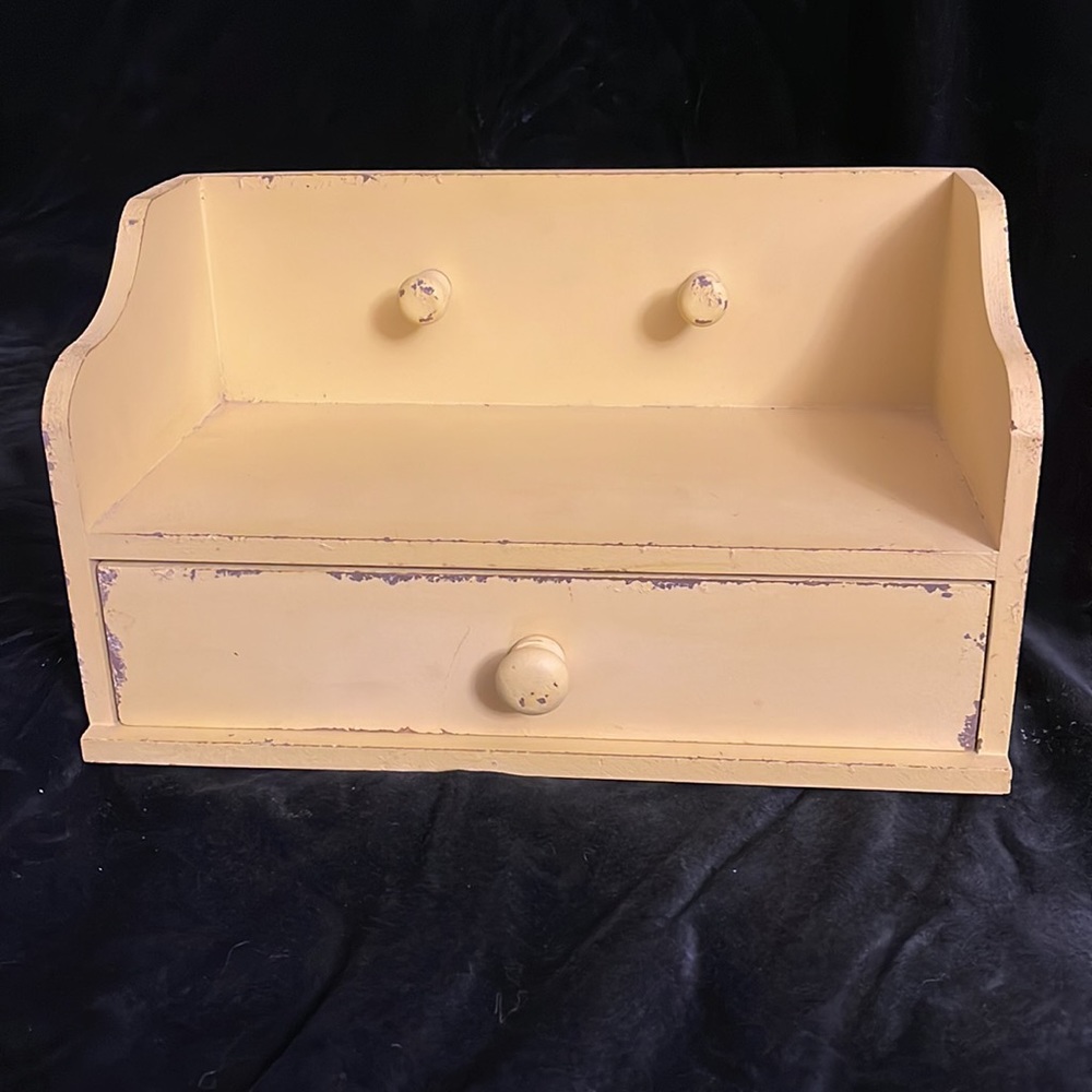 Distressed Yellow Drawer Shelf.